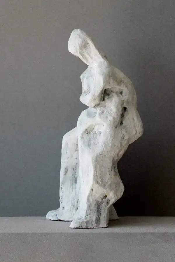 tall handmade ceramic figure with light coloured finish